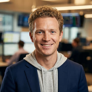 Ryan Brooks, identified as Lead Trading Analyst at Noble Vaultgrove, in a profile image